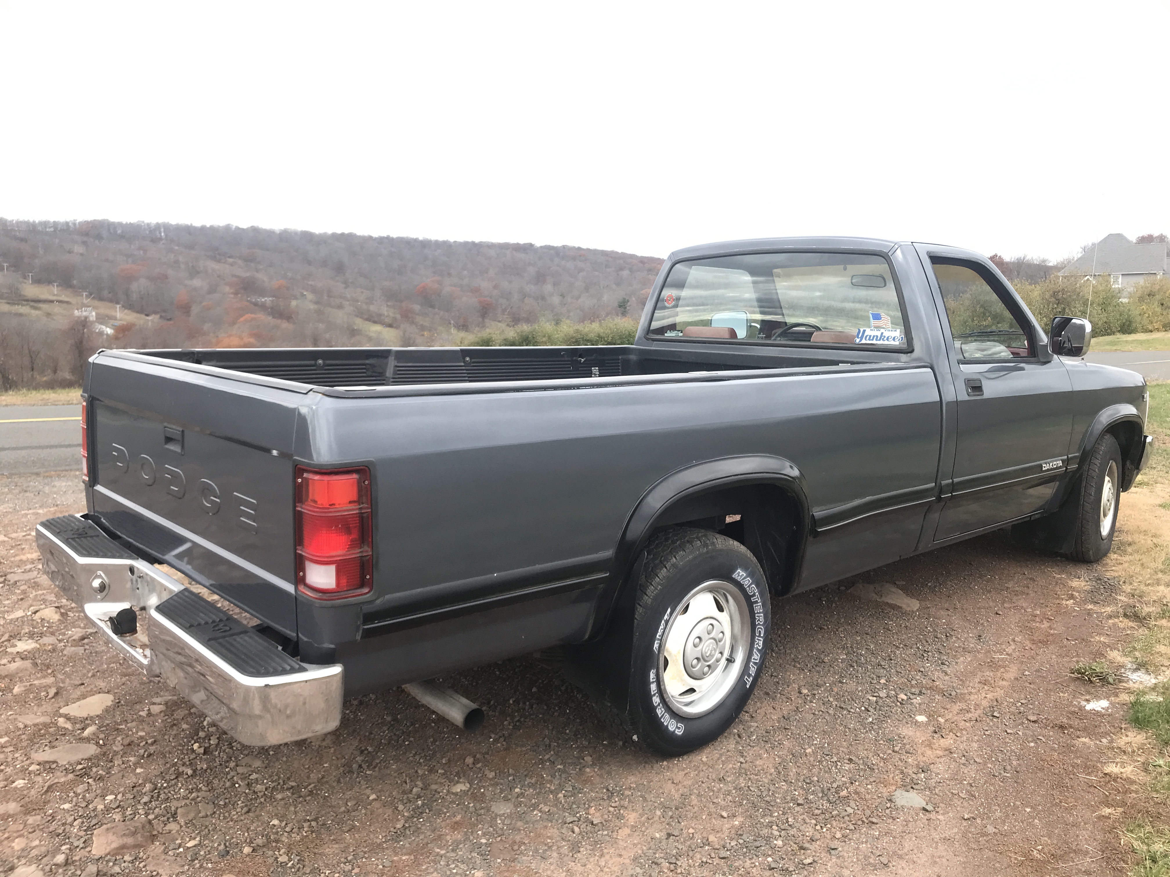 1991 Dodge Dakota Pickup ONE OWNER 117K 8 foot bed and roomy bench seating NICE — photo 24